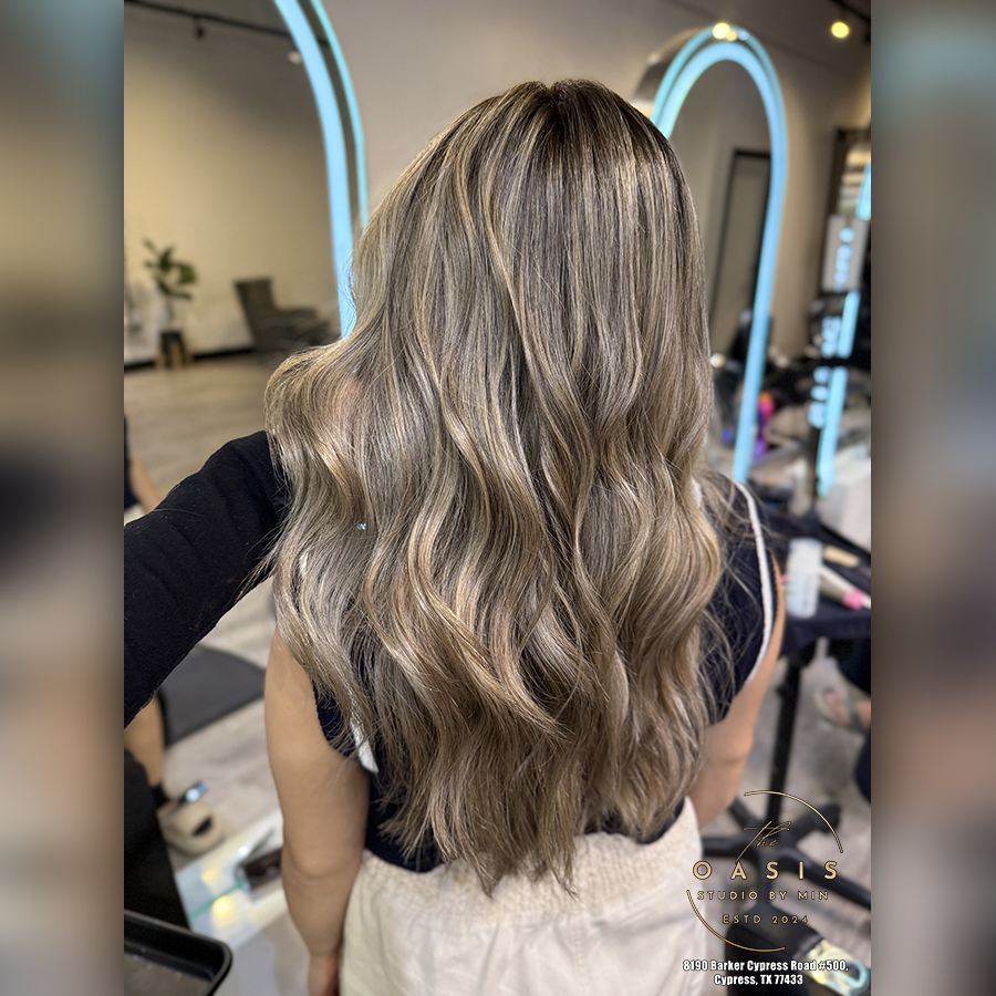 Soft, natural wave perm for long hair, adding effortless volume and movement