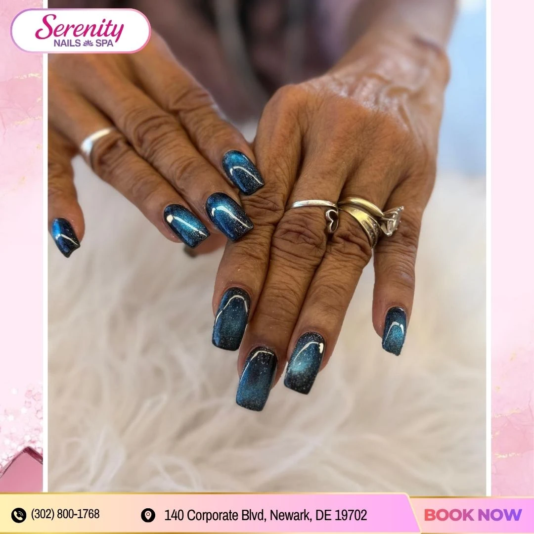 Deep blue cat-eye manicure at Serenity Nails & Spa