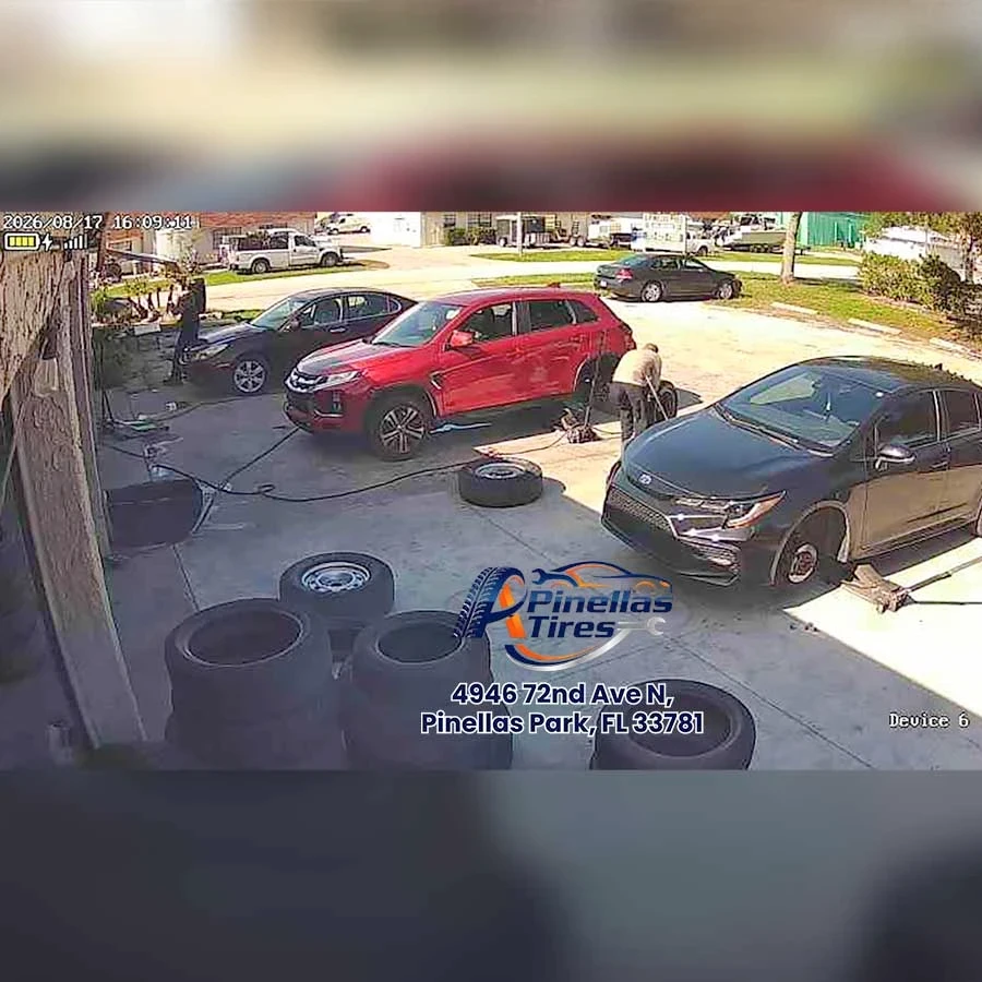 Technicians performing tire installation and replacement at A-Pinellas Tires in Pinellas Park FL