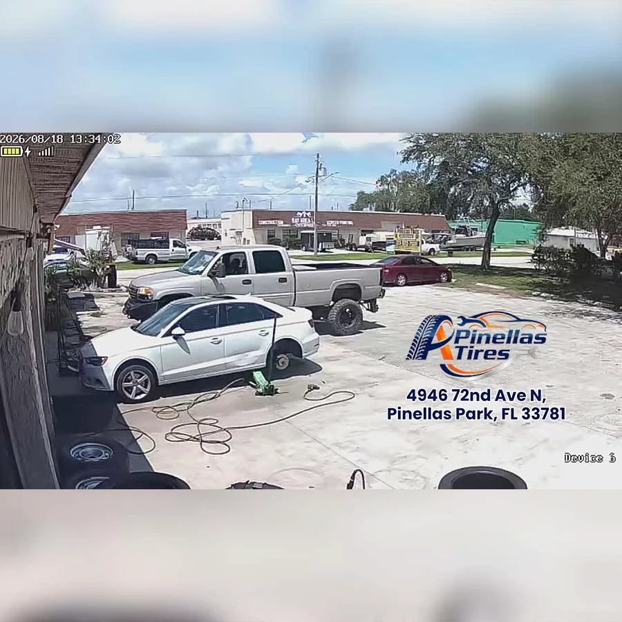 Same-day flat tire repair and tire rotation service at A-Pinellas Tires shop yard