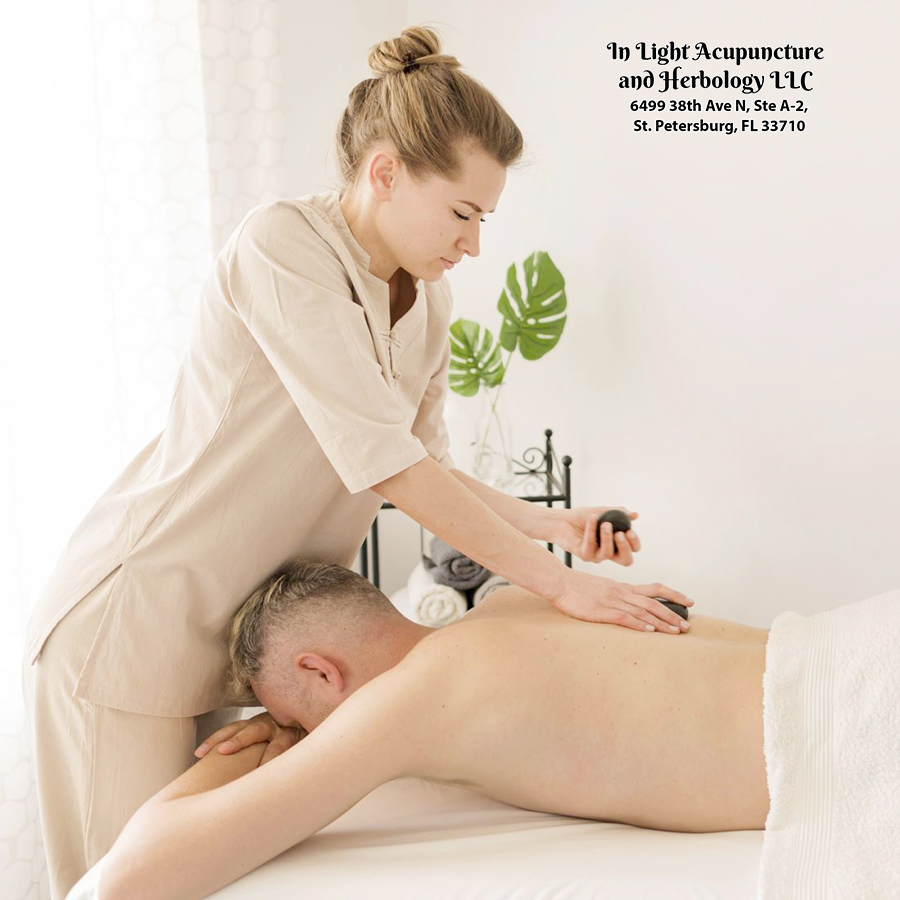 side-view-masseuse-working